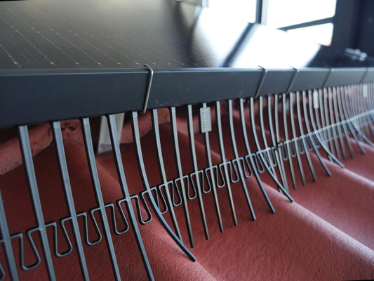 Example photo of BoxClips on a solar panel